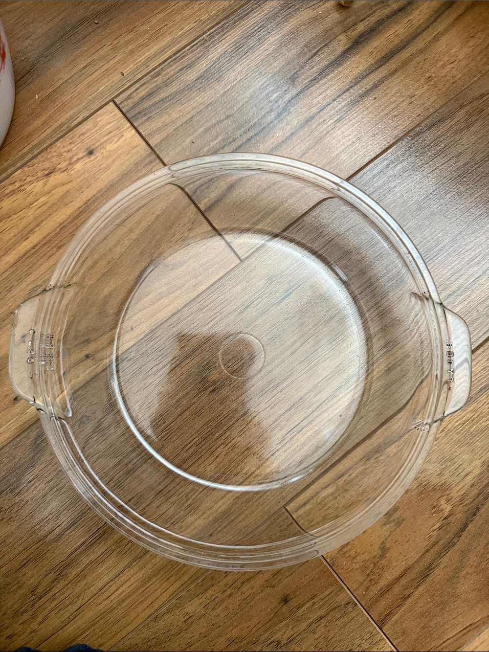 The Pyrex 683-C is a clear glass lid designed for vintage Pyrex 1.5-quart (1.5 L